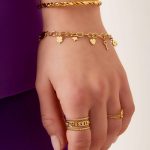 Bedel armbandje goud/zilver