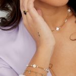 Bedel armbandje met steentjes goud/zilver